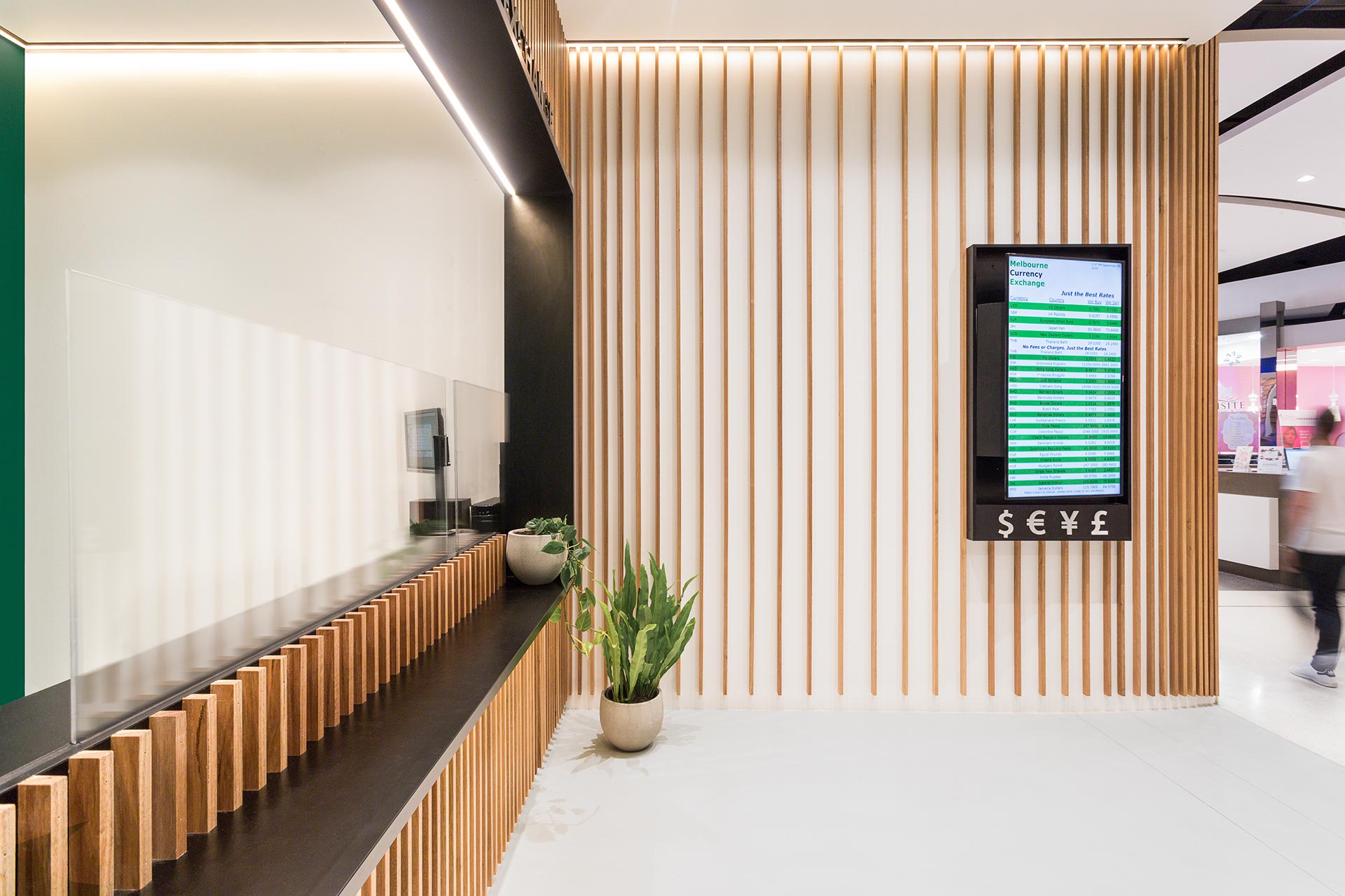 Melbourne Currency Exchange store with a customer rate display